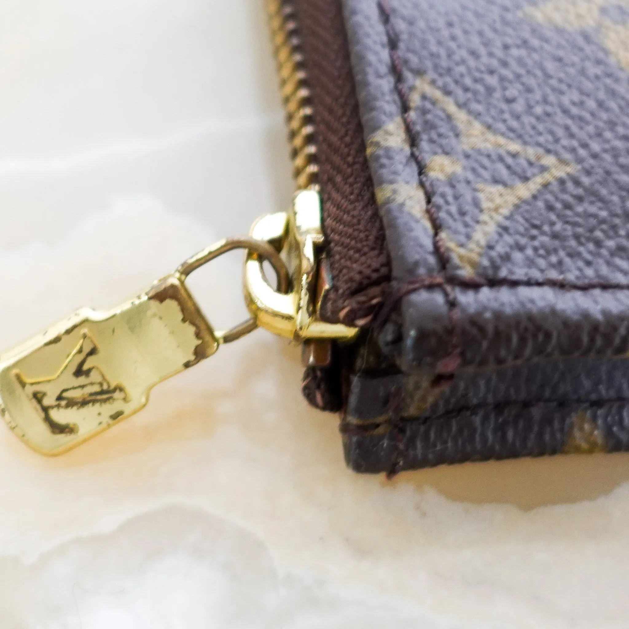 Monogram large pouch RRP £1.2k